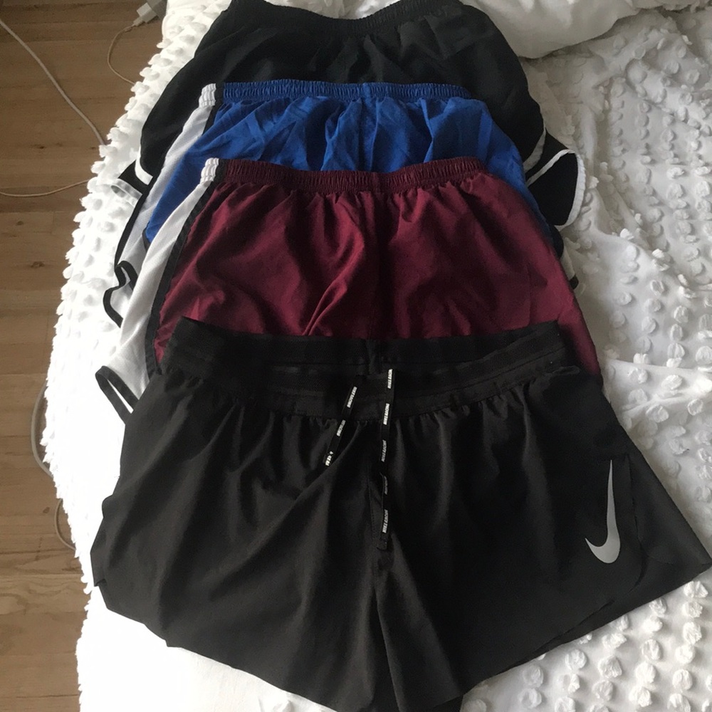 4 NIKE Running Shorts